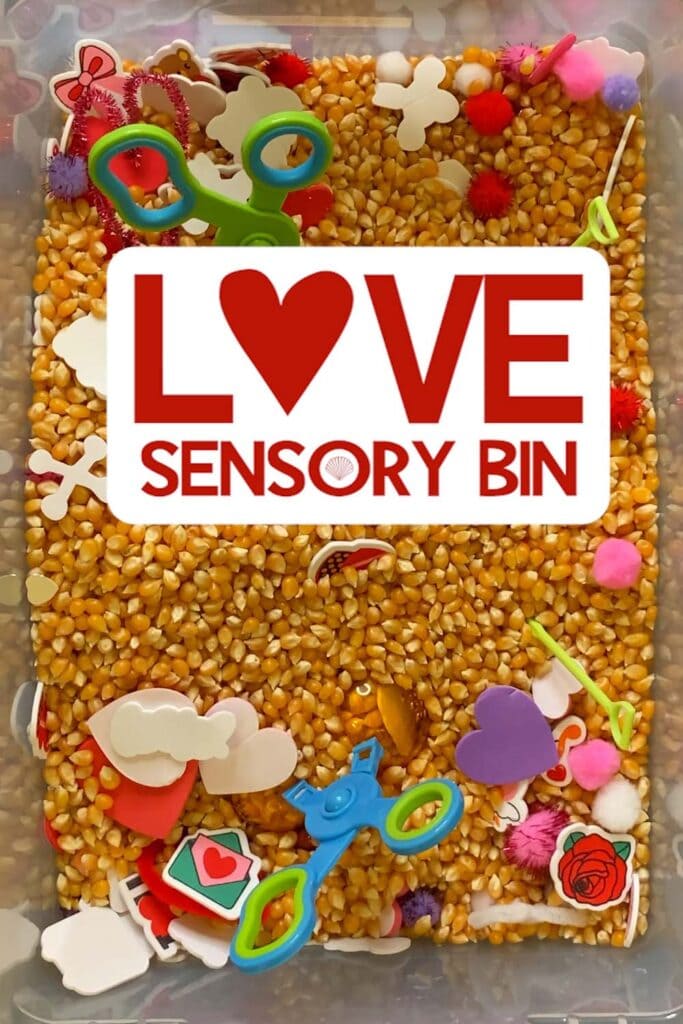 love themed sensory bin with hearts and other babbles