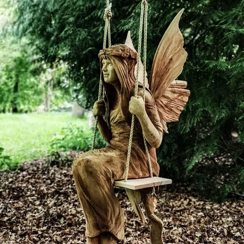 Wood Sculpture by Simon ORourke of Fairy in Swing