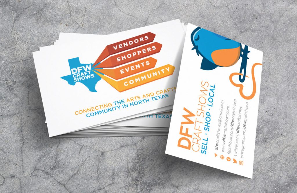A stack of professionally designed business cards sits on a marble background. The front and back of the cards are both visible showing information about DFW Craft Shows.